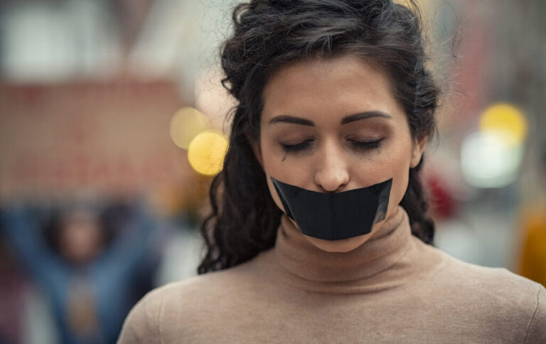 Domestic,Violence,Victim,With,Closed,Eyes,With,Runny,Mascara,On